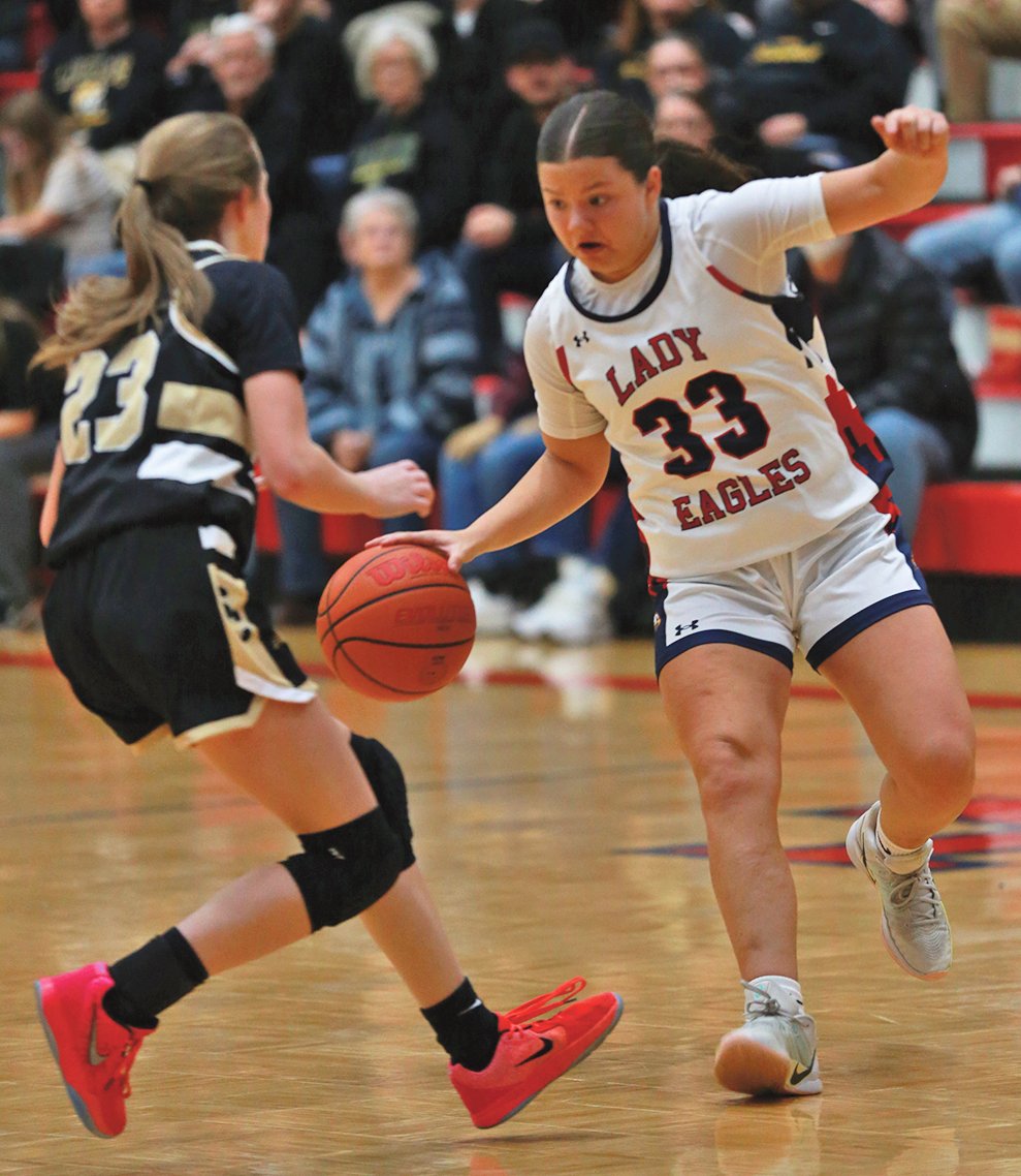 ParisPI's tweet photo. Mary Mabel Hutson (33) of the Lakewood Lady Eagles basketball squad dribbles against a Stewart County defender during the River Conference basketball championship on Dec. 8 at Henry County High School’s Gamlin Gymnasium. https://t.co/mUhhzRmDpU