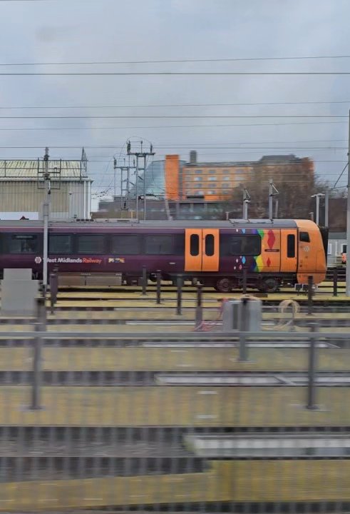 DanSpotter86's tweet image. Lovely shot of The Pride Livery Class 730018 seen here in Soho EMD Depot on a Dreary Wet Day on 17/12/25. @HunsletTheBear #Class730 #Westmidlandstrains #Wmt #Pride #Sohoemd #Birmingham