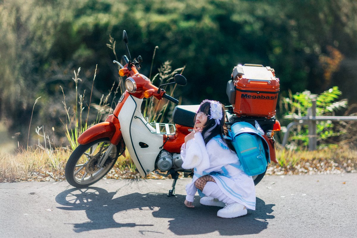 Documenting my journey on a red, Japanese-made Honda bike