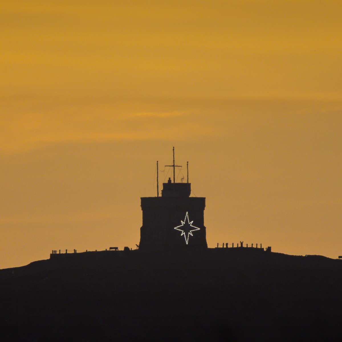 Cabot Tower this morning, shot from inside the warmth of my house.  lol