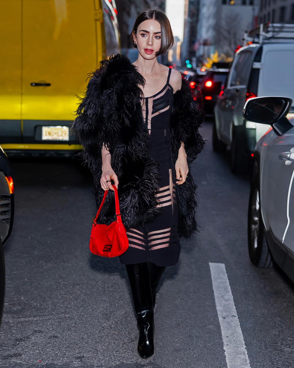 Fendi's tweet image. Archival dress, Baguette and new Fendi Arco boots
Captured on Lily Collins
Marking the Emily in Paris Season 5 release