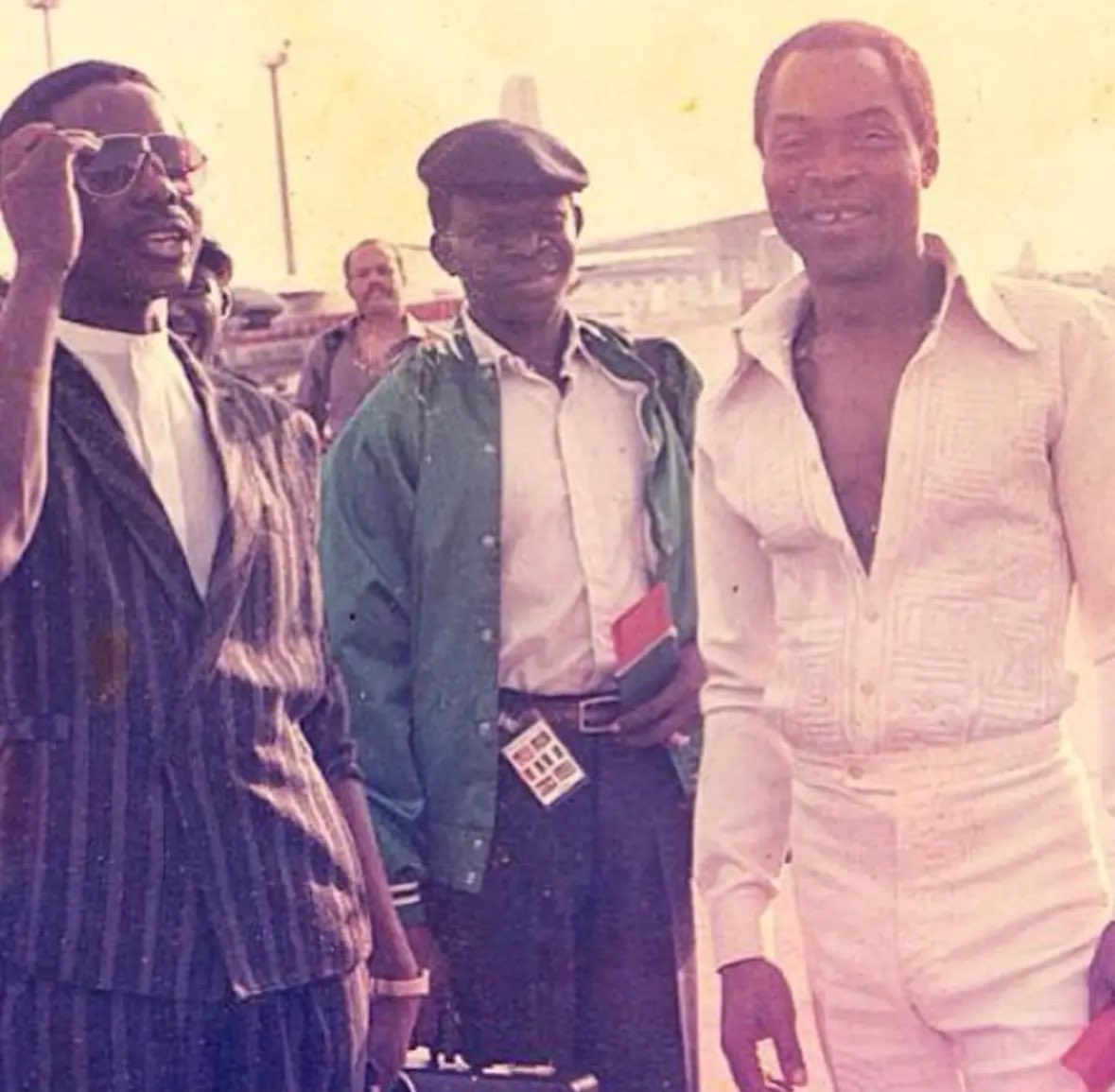 Yorubaness's tweet photo. Legendary Picture of King Sunny Ade and Fela Anikulapo Kuti at the airport in 1979 https://t.co/AcFMToUHbF