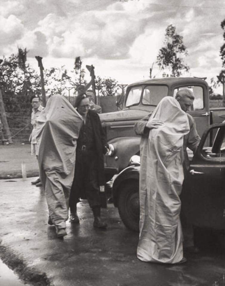 KResearcher's tweet image. These were informers known as Tûkûnia (disguised in sacks looking like the KKK) and used to identify so-called Mau Mau sympathizers. They were so feared because if they pointed you out in an identification parade, you fate was sealed. 
The tûkûnia (from ‘ngunia’) had reason to…