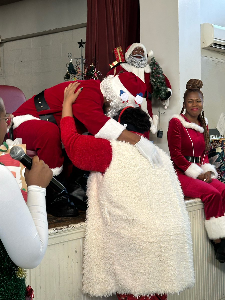 iamtheMJB's tweet photo. They say it’s better to give than to receive, but I think I’ve found the loophole: the joy I get from showing up for our clients is the greatest gift I could ask for. It’s even more special showing up as 🎅🏾. https://t.co/Lqv06D4jCD