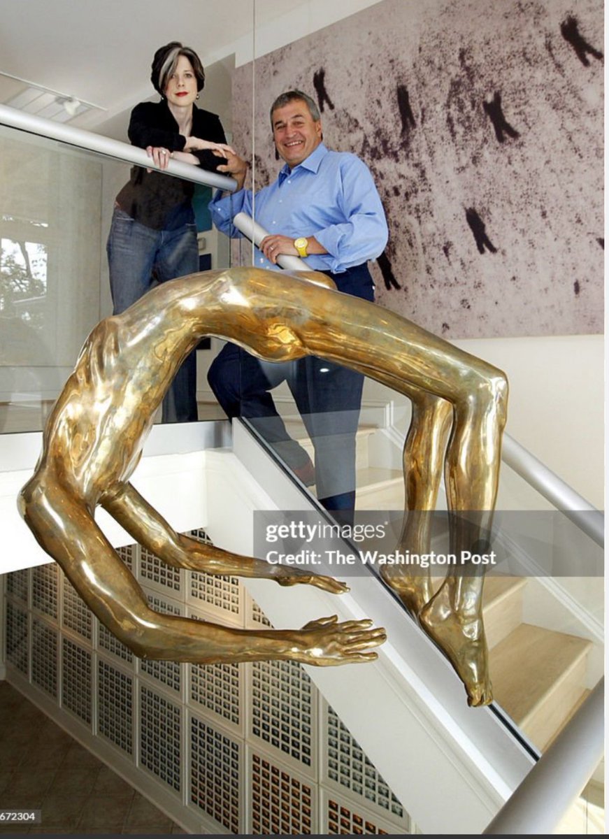 This creepy bride statue hanging in the stairwell of Jeffrey Epstein’s home is giving off the same vibe as the gold statue in Tony Podesta’s home. 

Tony’s statue titled The Arch of Hysteria by Louise Bourgeois – depicting a gold sculpture of a decapitated human positioned the