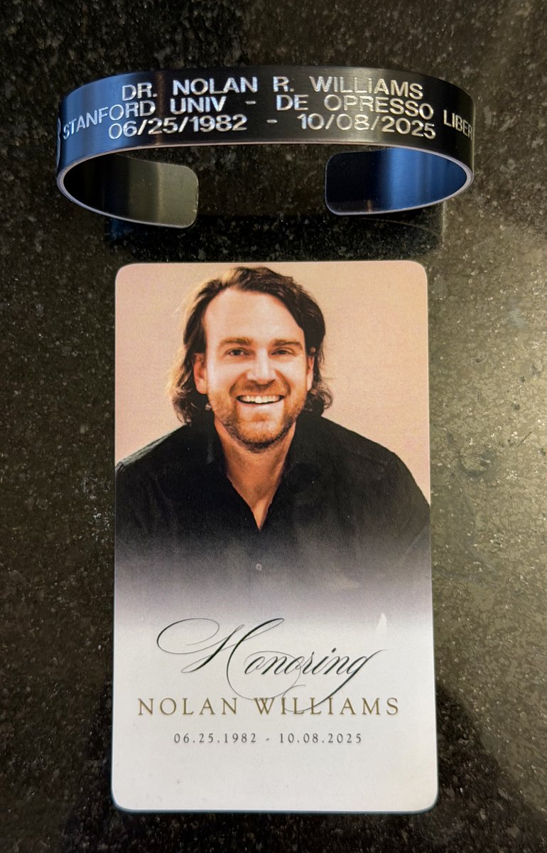 FutureJurvetson's tweet photo. We attended a touching and poignant funeral for Nolan Williams last night at Stanford's Memorial Church. About 500 people showed up, from far and wide. 

Tragically, just hours after his death, he was to be nominated to run a major government office. It is a tribute to his legacy, and I wanted to share, lest it be lost forever...

A U.S. Senator gave out wrist bands, a KIA tradition among special forces.

The Stanford chaplain did a wonderful job as did 10 speakers, intermixed with some of Nolan's favorite music, including Stairway to Heaven.

The rear of the card reads:

WHEN THE FORM OF SOMEONE YOU LOVE DISSOLVES,
THE LOVE ITSELF REMAINS.
IT BECOMES YOUR TEACHER,
YOUR COMPANION,
YOUR FAITH.
   — ATTRIBUTED TO RAM DAS