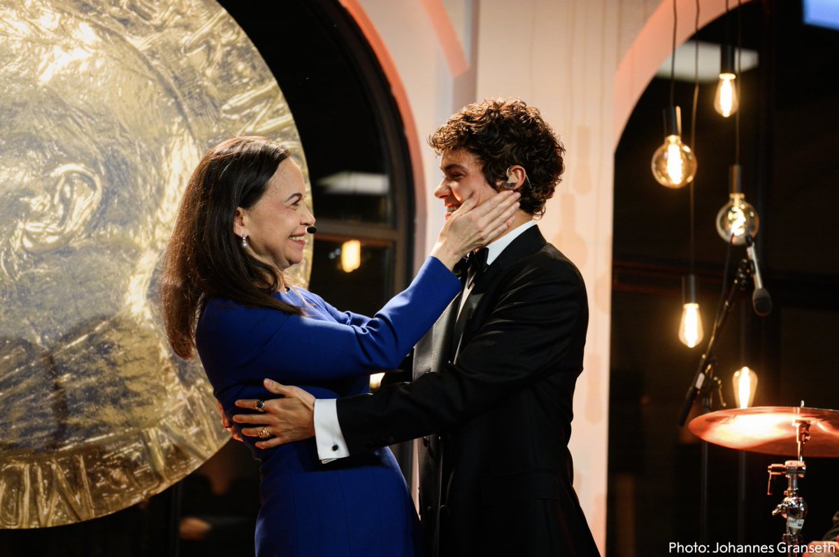 NobelPrize's tweet image. “The exhibition captures the essence of our struggle.”

As part of the Nobel Peace Prize celebrations last week, this year's peace prize laureate @MariaCorinaYA opened the 2025 Nobel Peace Prize exhibition. The opening was accompanied by a live performance from Venezuelan and…