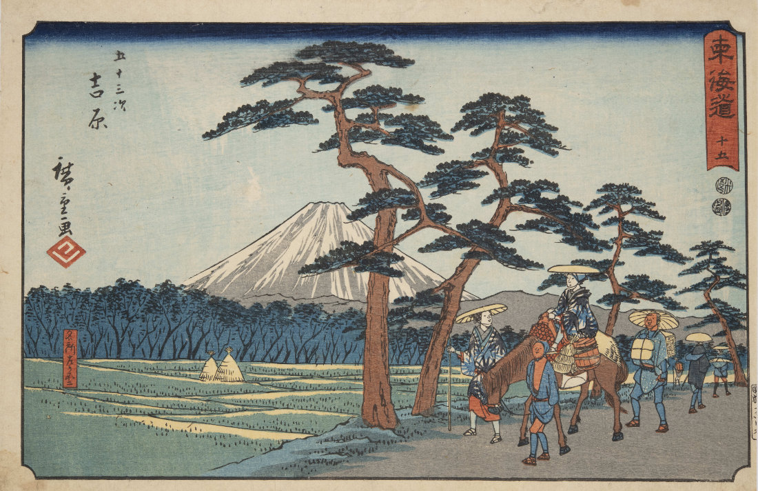 ほがらかな表情で道中を行く荷物持のおじさん。その息子でしょうか、馬