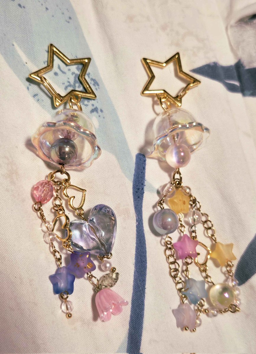 Oh I forgot to post these i think !! I made my signature necklace and some jellyfish keychains for me and bff ^_^ ill prolly make more of these next conventiom
