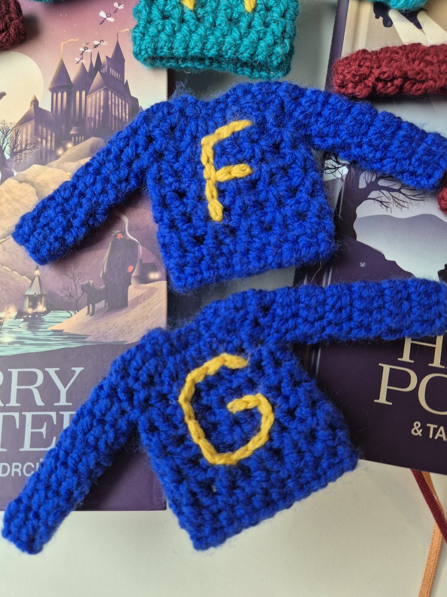 Just finished these Weasley jumpers. Fred and George's are book 1-accurate. Harry and Ron's are the right colour but have letters, unlike in the book. Percy's canonically has the letter P but we are not told the colour. Minerva posing of course.
Merry Christmas <a href="/jk_rowling/">J.K. Rowling</a>