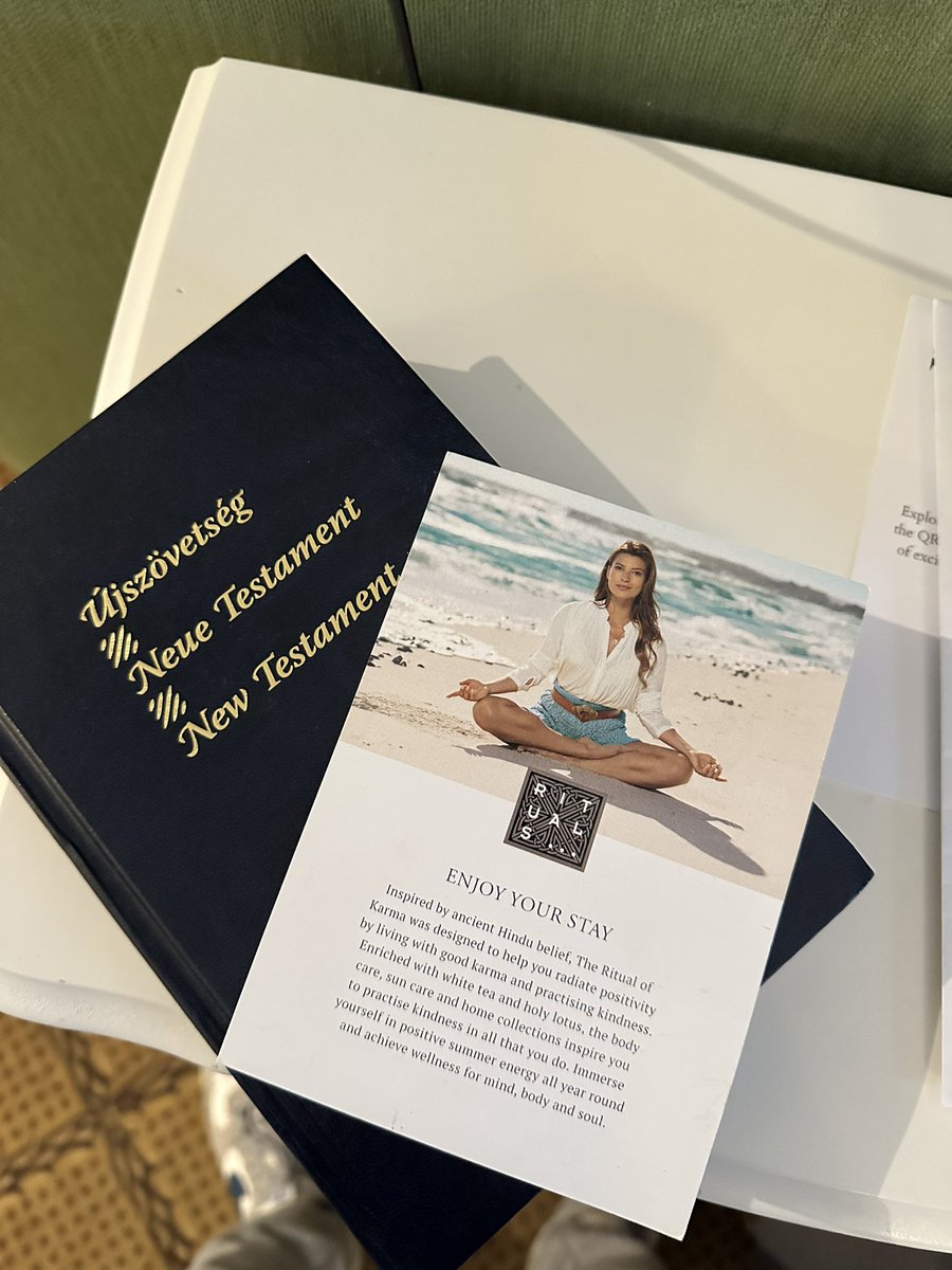 sujayko's tweet image. At a really nice hotel in Budapest..

The leaflet was on top of the side table, the New Testament book on a shelf right under.