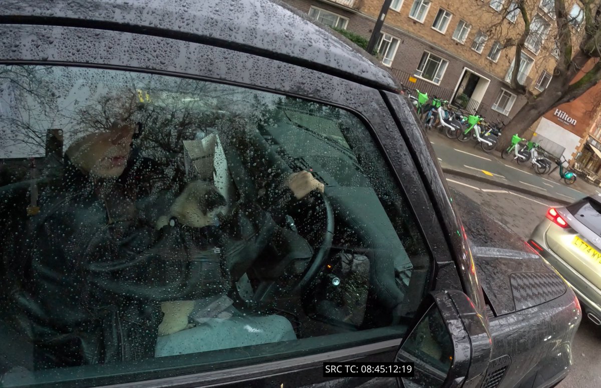 MikeyCycling's tweet image. I caught 4 drivers on the way to Gavin Kiernan's sentencing. It seems traditional to catch a bunch more lawbreakers when going to court. Here's another idiot with an unrestrained dog in his lap. Two other drivers running red lights, and this other gas plumber on his phone.