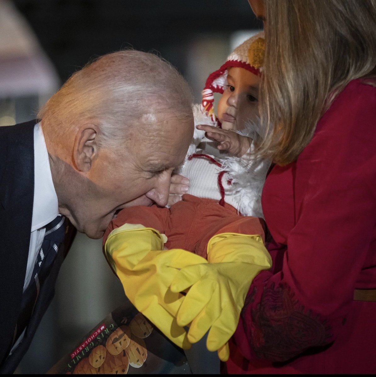 Leeleeliberty11's tweet image. Anyway, Here’s Biden biting a strangers baby.