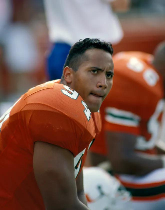 FBGreatMoments's tweet image. In 1994 some guy named Dwayne Johnson was a backup defensive lineman for the Miami Hurricanes.