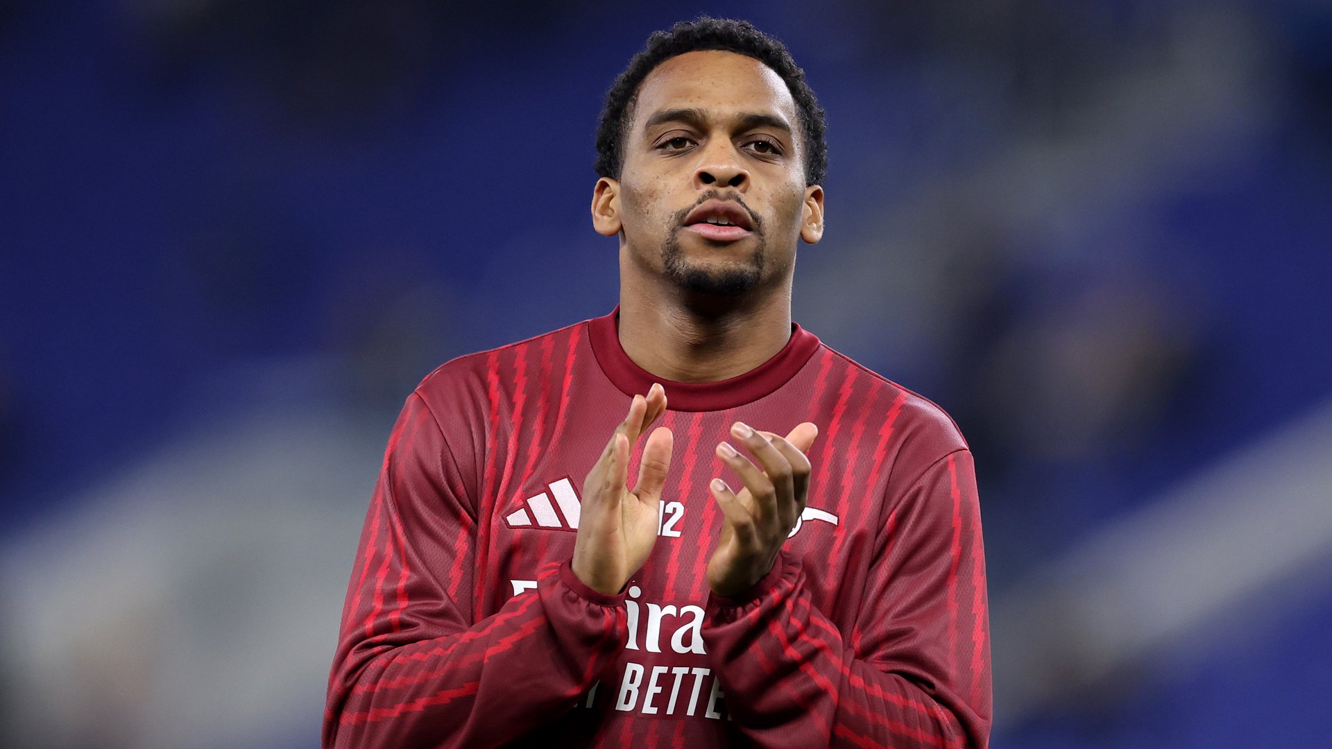 Jurrien Timber applauds supporters in the away section at Hill Dickinson Stadium.