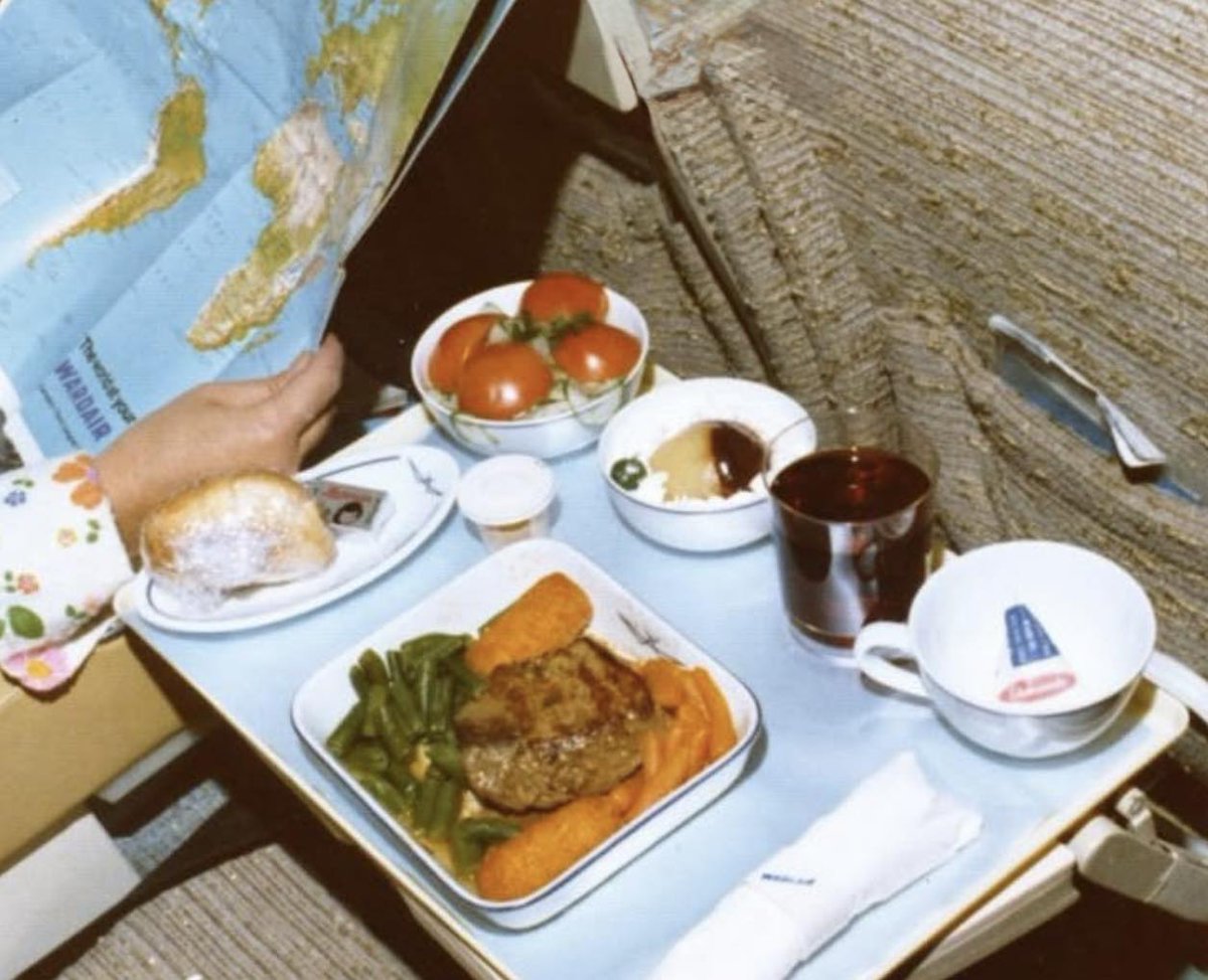 Since I mentioned Wardair meals earlier, thought I would dig up this photo of an old Wardair meal from the 70s.