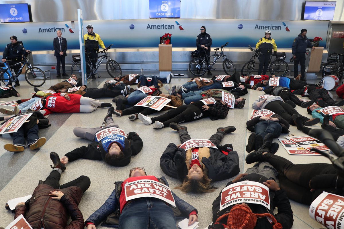 UNITEHEREPhilly's tweet photo. Today @PHLAirport, Sky Chefs workers who cater flights for @AmericanAir &amp; other airlines escalated their call for better wages &amp; healthcare. 

Sky Chefs workers are at risk via a new protocol at some U.S. airports. The action included a die-in to call attention to safety concerns https://t.co/TbfOlpISpm