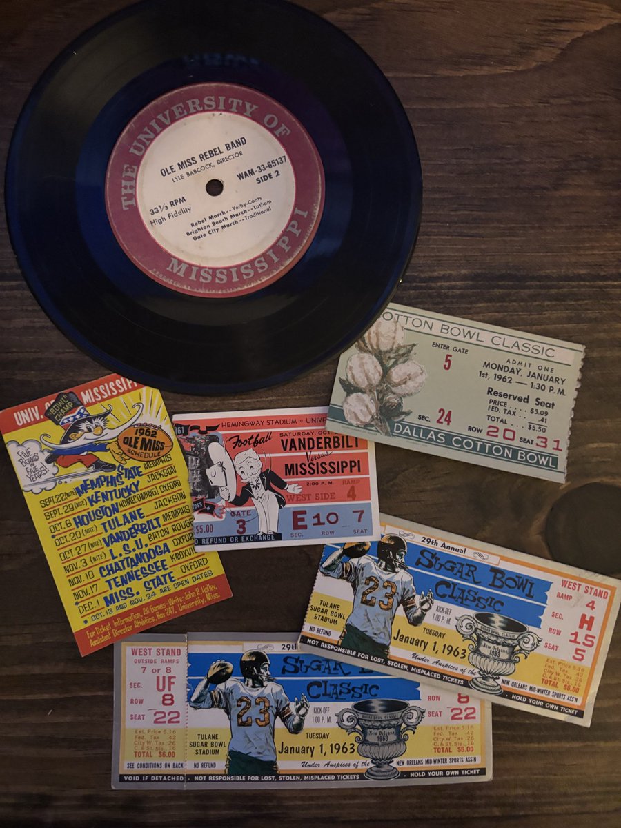 MidTNAng's tweet photo. Bringing out some artifacts to enjoy the @OleMissFB game! 1962 Ball signed by the team for my mom's dad (she was married to OM player Chuck Morris) and some 1962 and 1963 Bowl game tickets ❤️💙 #hottytoddy #OleMissRebels #olemissfootball https://t.co/nN33ckct6F