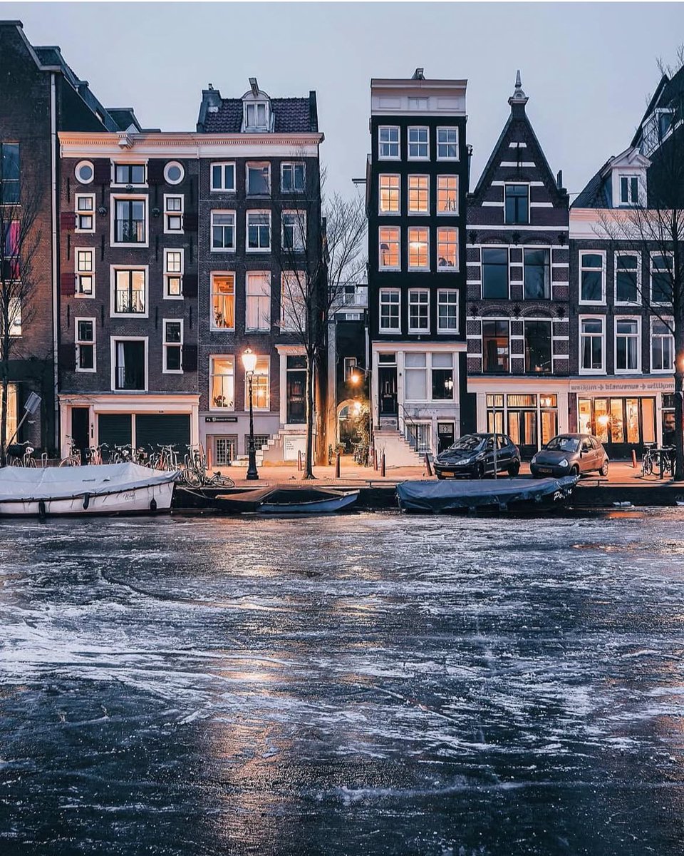 earthcurated's tweet image. Winter in Amsterdam ❄️