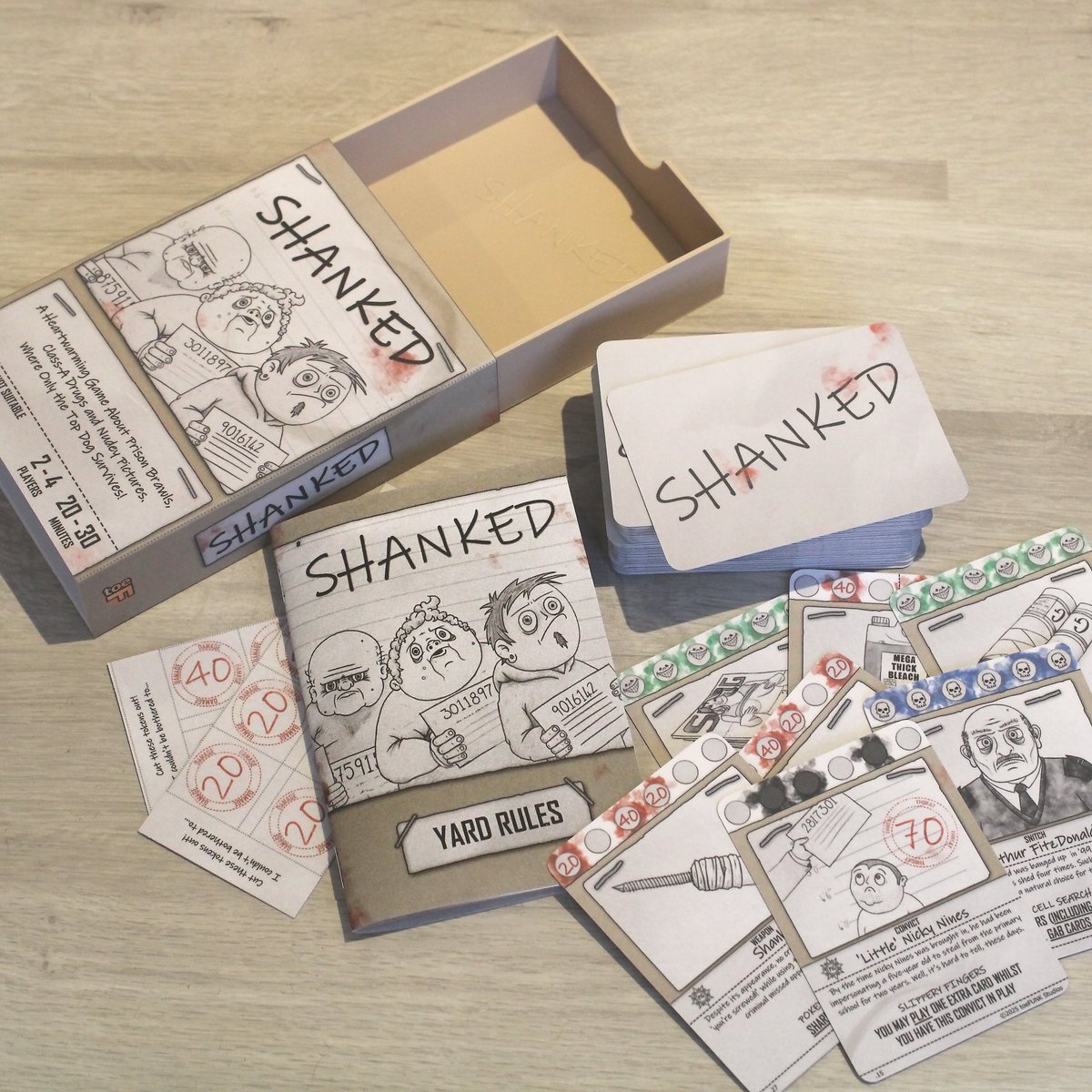 toeFUNKstudios's tweet image. COMING 2026!!!  

Here are our product shots for our upcoming handmade card game Shanked 

It's a heartwarming game about prison brawls, Class-A drugs and nudey pictures, where only the top dog survives.  #tabletopgaming #gaming