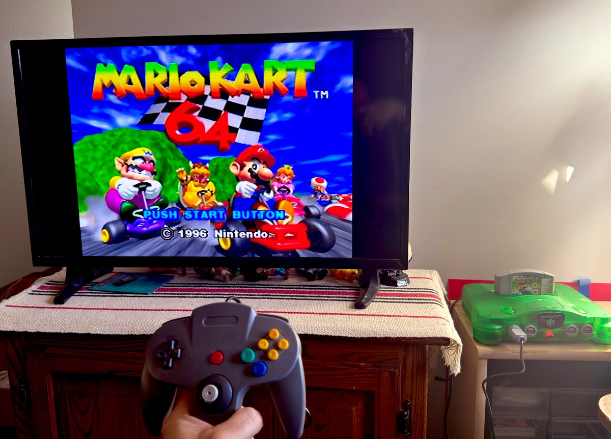 Need a Nintendo 64? 🌈 

Consoles
💚 3 jungle green 
🖤 1 black 

• Power + AV Jacks included 

TESTED + WORKING 🔥 

Build your bundle 👇 

Controllers: 
2 Wireless Jungle Green Brawlers 
8 Original Nintendo OEM controls
1 NEW - Retro.Bit wired controller
5 3rd Party