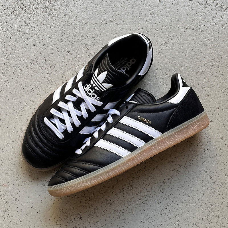 Select sizes are 50% OFF for the black/white-gum adidas Samba