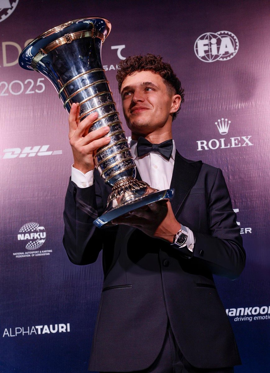 wisterianorris's tweet photo. lando norris is a new relationship status: in a serious relationship with the drivers’ championship trophy https://t.co/Y1FEzE60vf