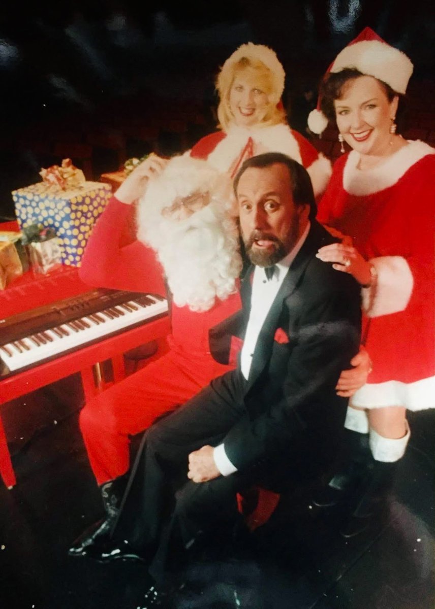 RayStevensMusic's tweet photo. #Christmas is only 4 days away! Here's a picture of Ray Stevens sitting on Santa's lap next to his red piano. Special thanks to Susan Andrews Thompson (on the right) for sharing this photo with us. Merry Christmas! 🎅🏻
#santaclaus #photowithsanta #picturewithsanta #merrychristmas https://t.co/mFoCiUvKrq