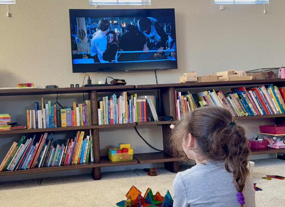 Showed 5yo Titanic, on her insistence

At first she kept grabbing onto me and crying “I don’t want Jack to die!”

Then she took matters into her own hands, building herself a magna-tile Titanic and removing pieces from it as the ship sank, with the final piece representing Jack