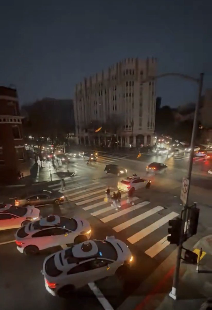 garygrindle's tweet image. During yesterday’s massive SF power outage, Waymo robotaxis froze at dark intersections, blocking traffic and forcing service suspension.

Tesla vehicles with FSD kept driving smoothly—using vision-based inference to treat unlit signals like 4-way stops, just like human drivers.…