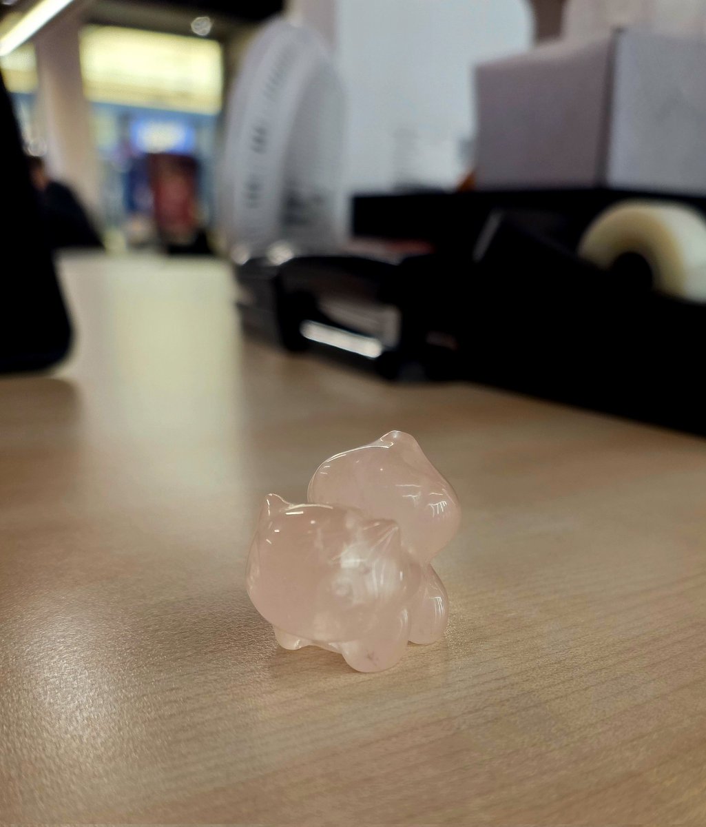 This is Trevor my rose quartz Bulbasaur  he keeps me sane at work now