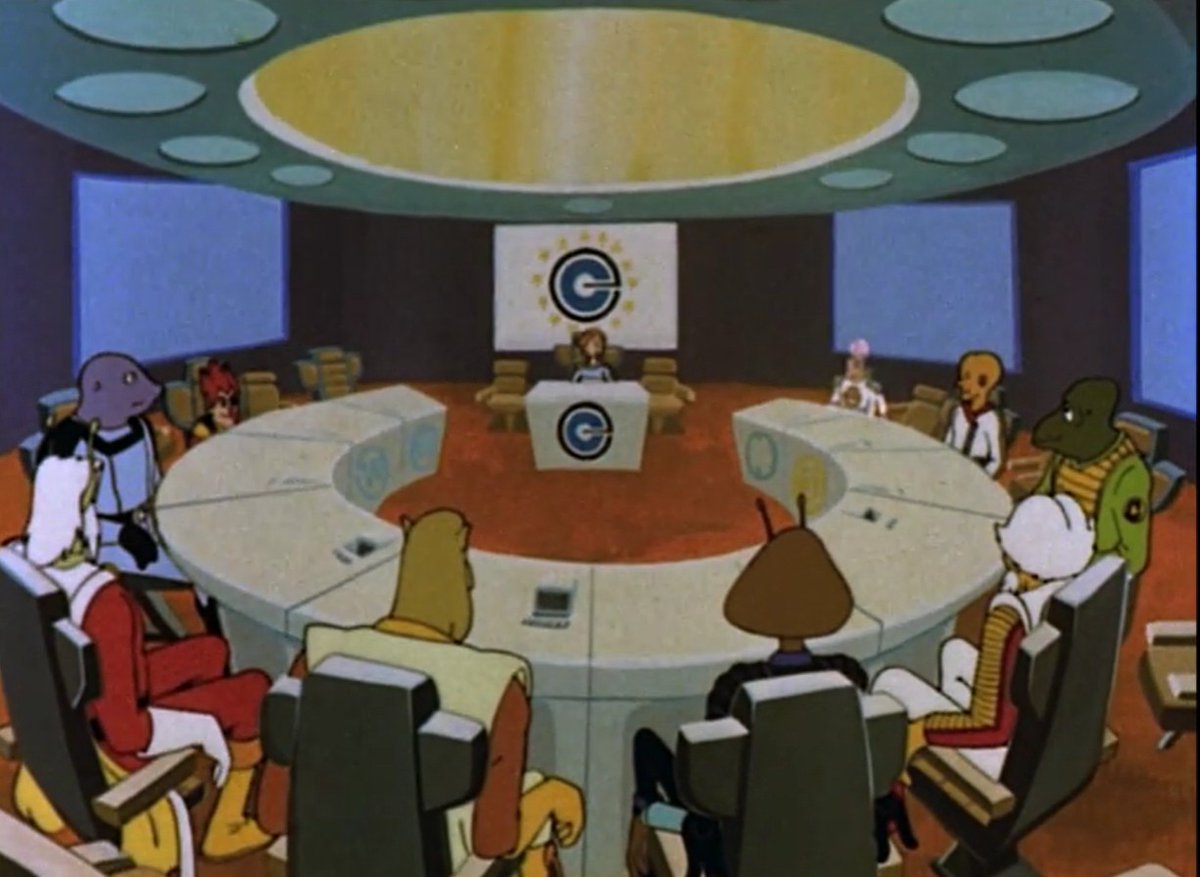 1981, Conseil d'Omega. Comme un air de conseil de l'UE 1986-1995 (ils sont 12). 
Le drapeau d'Omega au fond est celui de l'UE...5 ans avant qu'il le devienne officiellement (il était déjà celui du conseil de l'Europe)