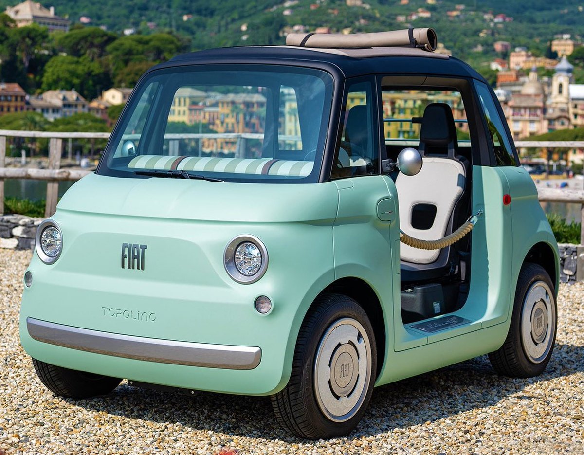 sainzinnorris's tweet image. lando in his fiat jolly and carlos in his fiat topolino in the streets of monaco. anything can be carlando for those with eyes to see...