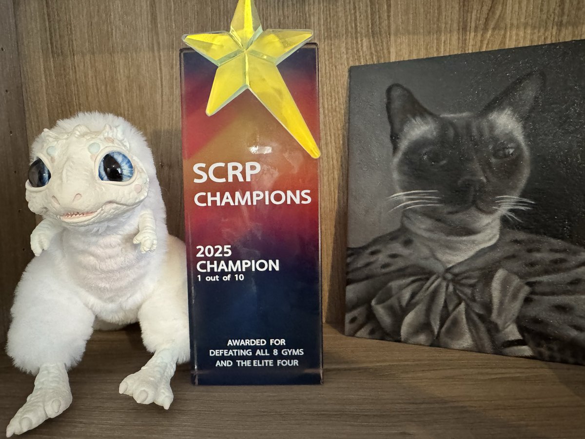 viennavtuber's tweet image. Got my SCRP2 Champion trophy in! 

It goes great next to my autism creature and royal portrait of my cat