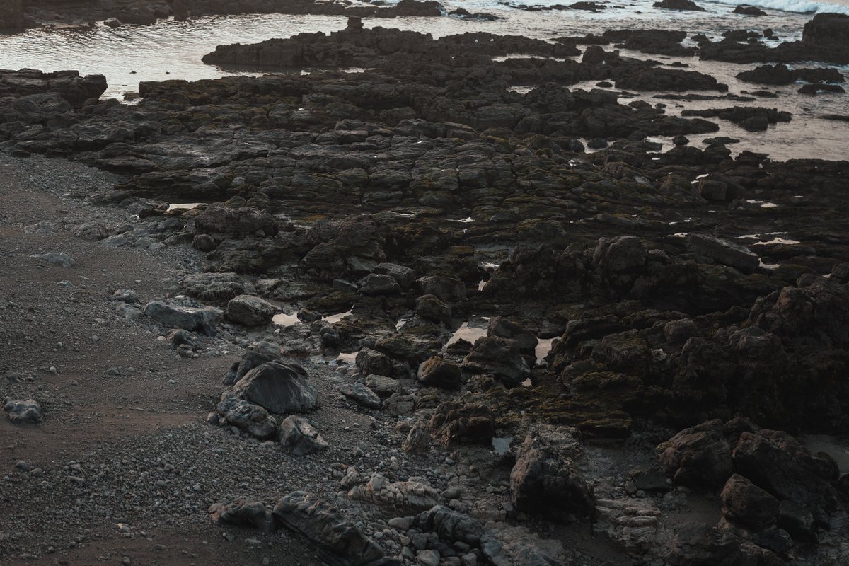 Rocks at the beach. If I ever get a new camera I will not announce it, but there will be signs.