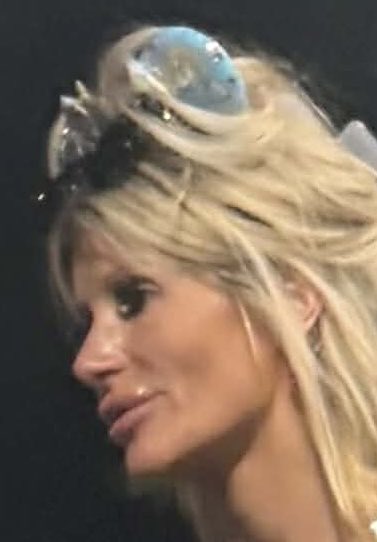 This was at one of the park bus stops last evening. I would show you her lower half but this is a family event.