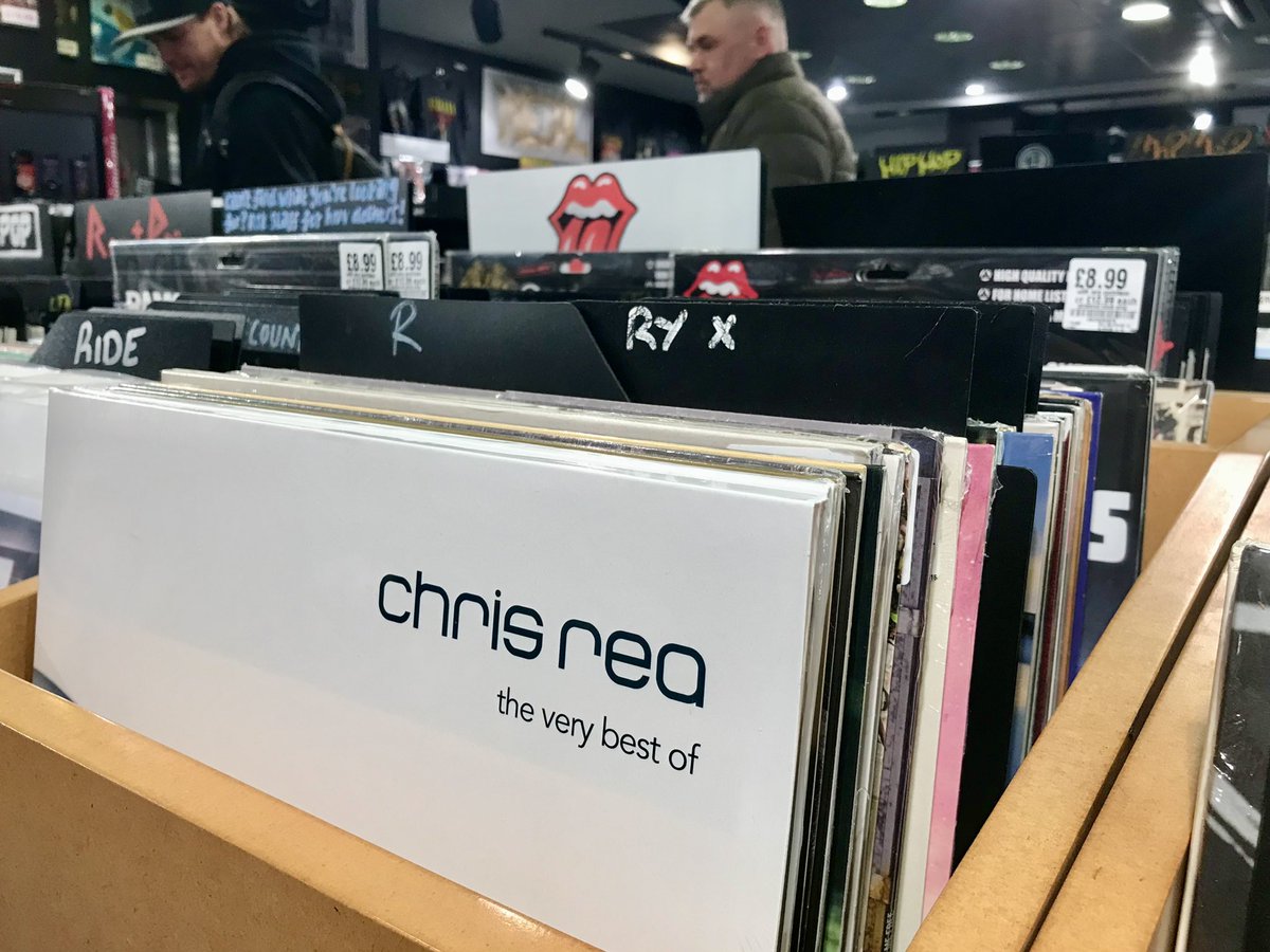 TeesPHI's tweet photo. Farewell Teesside rock star #ChrisRea who has died. His albums are pictured here in Middlesbrough HMV. His songs symbolise the 1980s &amp; ‘90s but remain popular today. Our favourites are Steel River &amp; Stainsby Girls. Perhaps next week’s No 1 will be Driving Home for Christmas? RIP https://t.co/yY3iH2FV24