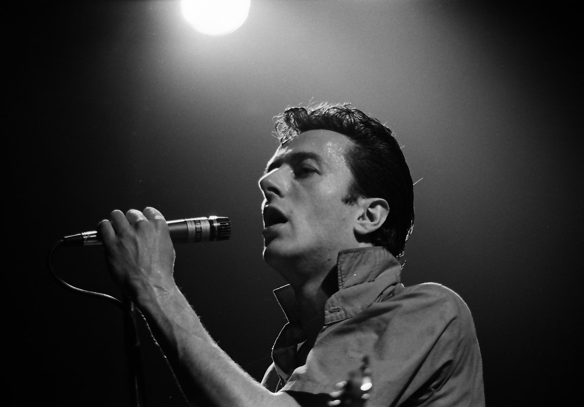 Today in 2002 we lost <a href="/JoeStrummer/">Joe Strummer</a> of <a href="/TheClash/">The Clash</a> What songs that Joe sang solo or with the band do you love? - <a href="/JoeRockWBAB/">Joe Rock</a> #Rock #Punk #JoeStrummer #TheClash #RockOnRock #TodayInRock #WBAB 📸 Wikimedia Commons Photo Submitted By User Kigsz (CC BY 2.0) bit.ly/3F0QFBA