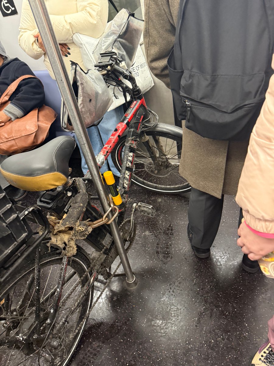 MannyJ61's tweet photo. ⁦@MTA⁩ so when are you going to put an end to the fire hazards you allow during rush hour. We literally have to climb over bikes to get on and off the train. https://t.co/8wVyEPAVwC