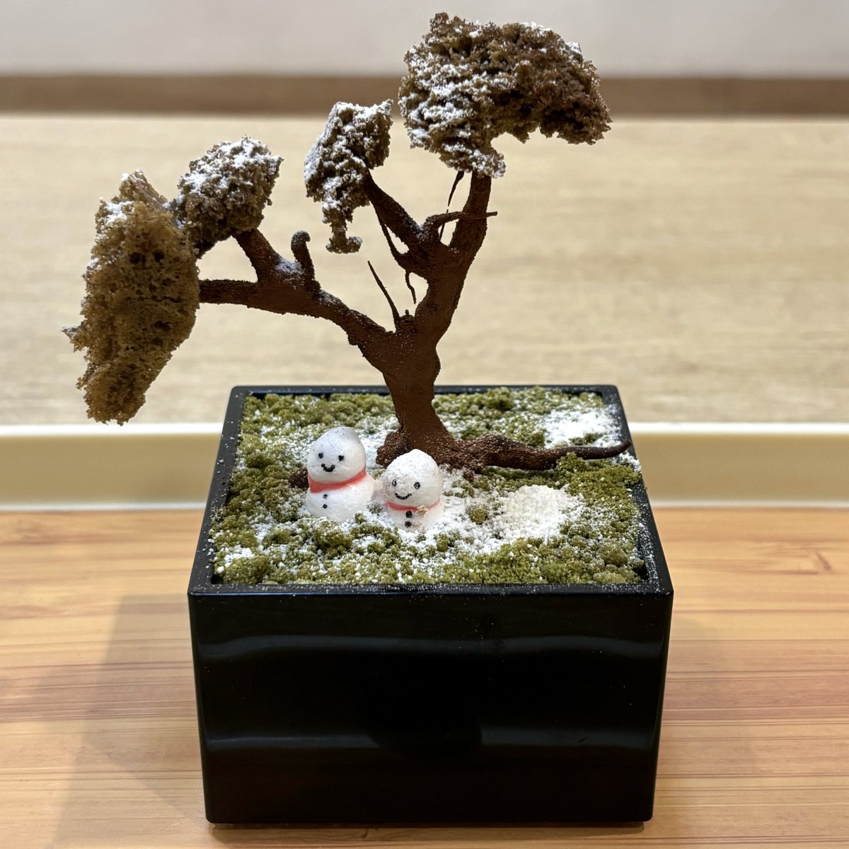 ciannamongal's tweet image. matcha tiramisu with two little snowmen under a tree was all it took to make me fold…