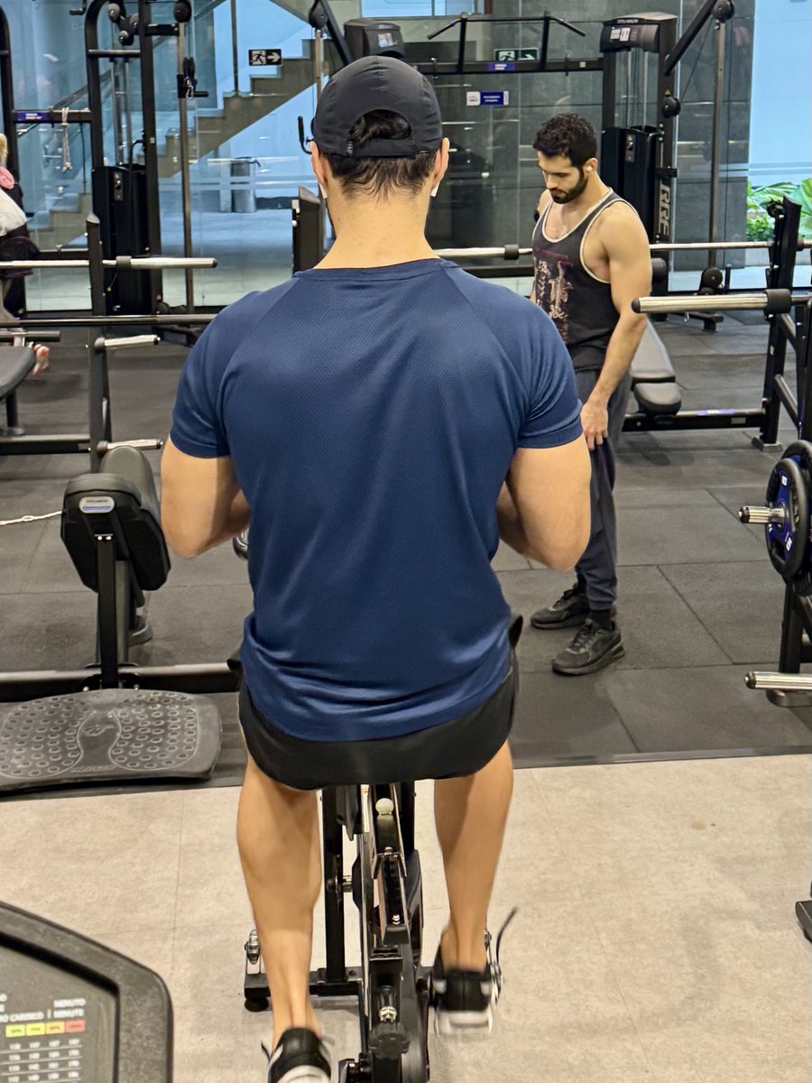 BosGuy's tweet photo. My gym crush opted to do his cooldown on a bike in front of my treadmill. This is what I call #gymspiration. https://t.co/OVBtT628HF