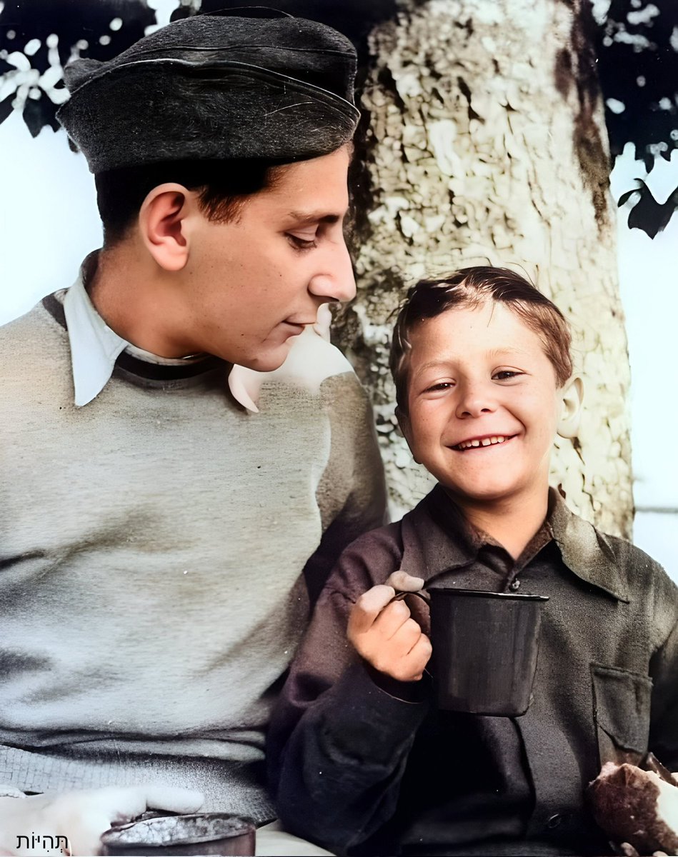 Buchenwald, 1945. 

Hiding under a pile of dead corpses, little Yisrael Meir Lau and his older brother Naftali suddenly heard an exclamation in Yiddish: “Yidden, ir zent frei!!!"(“Jews, you are free”).

The words are coming from American chaplain Rabbi Herschel Schacter. 

Later,