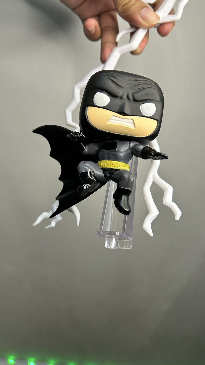 pixelbren's tweet photo. hey @grok edit my batman funko pop to have a dramatic and epic scene https://t.co/HH77G4qN3c