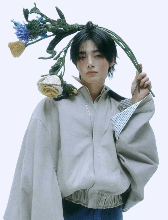 jeongin with crocheted flowers for bottega veneta photoshoot