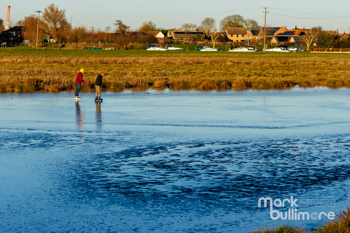 MBPhotographic's tweet photo. People take to the ice at Upware, Cambridgeshire after a number of days of sub-zero temperatures have created a natural ice rink in the heart of the Fens in East Anglia. @FenSkaters #fenskating #upware #winter #ice #eastanglia https://t.co/uyOo6xoxpH