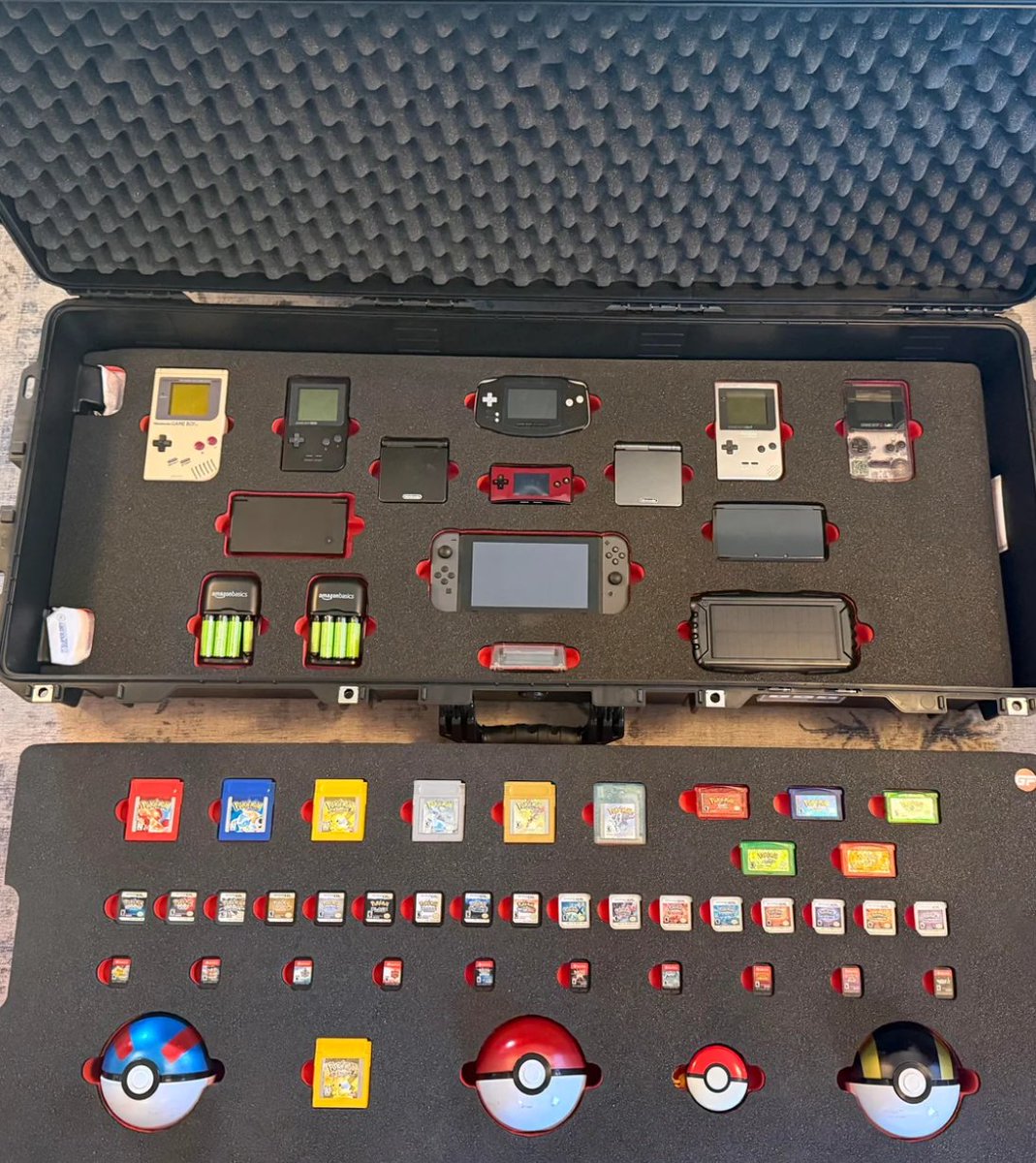 FutureSightHQ_'s tweet image. A hardcore Pokémon fan has shared his custom case of games and devices he's prepared in case of an apocalypse 😯

Posting on Reddit he wrote: "Don’t worry guys. If the apocalypse ever happens, I’ll make sure Pokémon survive.

Still have every Pokémon I’ve ever caught.

I’ll keep…