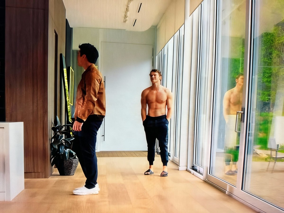 Does anyone have a high res version of this image or something from that scene? I'd love to make a phone wallpaper of Ilya happily standing there watching his man inside his home. #heatedrivalry #ilyarozanov #connorstorrie #jacksonparrell <a href="/JacksonParrell/">Jackson Parrell</a> #jacksonyeung