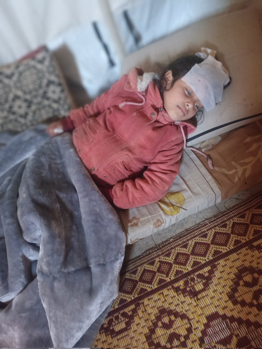 My daughter Kinda has been in this condition since yesterday. She is very ill because of the severe cold and the lack of heating in the tents.

She is now suffering from coughing and a high fever, and I cannot find medicine for her.

This is my daughter, the apple of my eye.