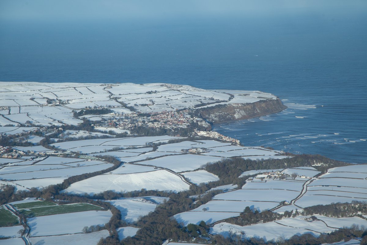 mesheaton's tweet photo. The skies cleared so a flight to the east coast was a must. Here's a snowy Whitby and Robin Hood's Bay. @Hudsonweather https://t.co/OoNfRnmXe3