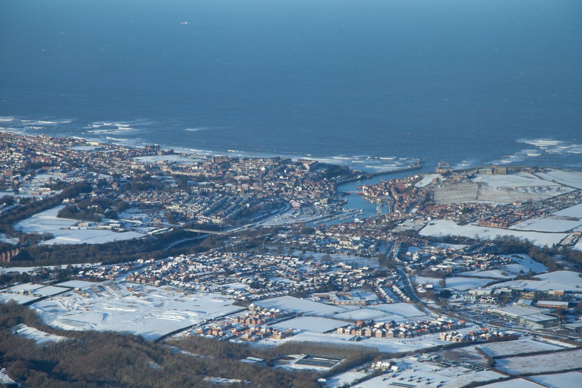 mesheaton's tweet photo. The skies cleared so a flight to the east coast was a must. Here's a snowy Whitby and Robin Hood's Bay. @Hudsonweather https://t.co/OoNfRnmXe3